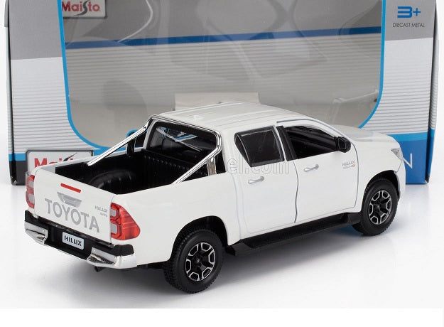 Toyota Hilux alba - 1/27 Maisto