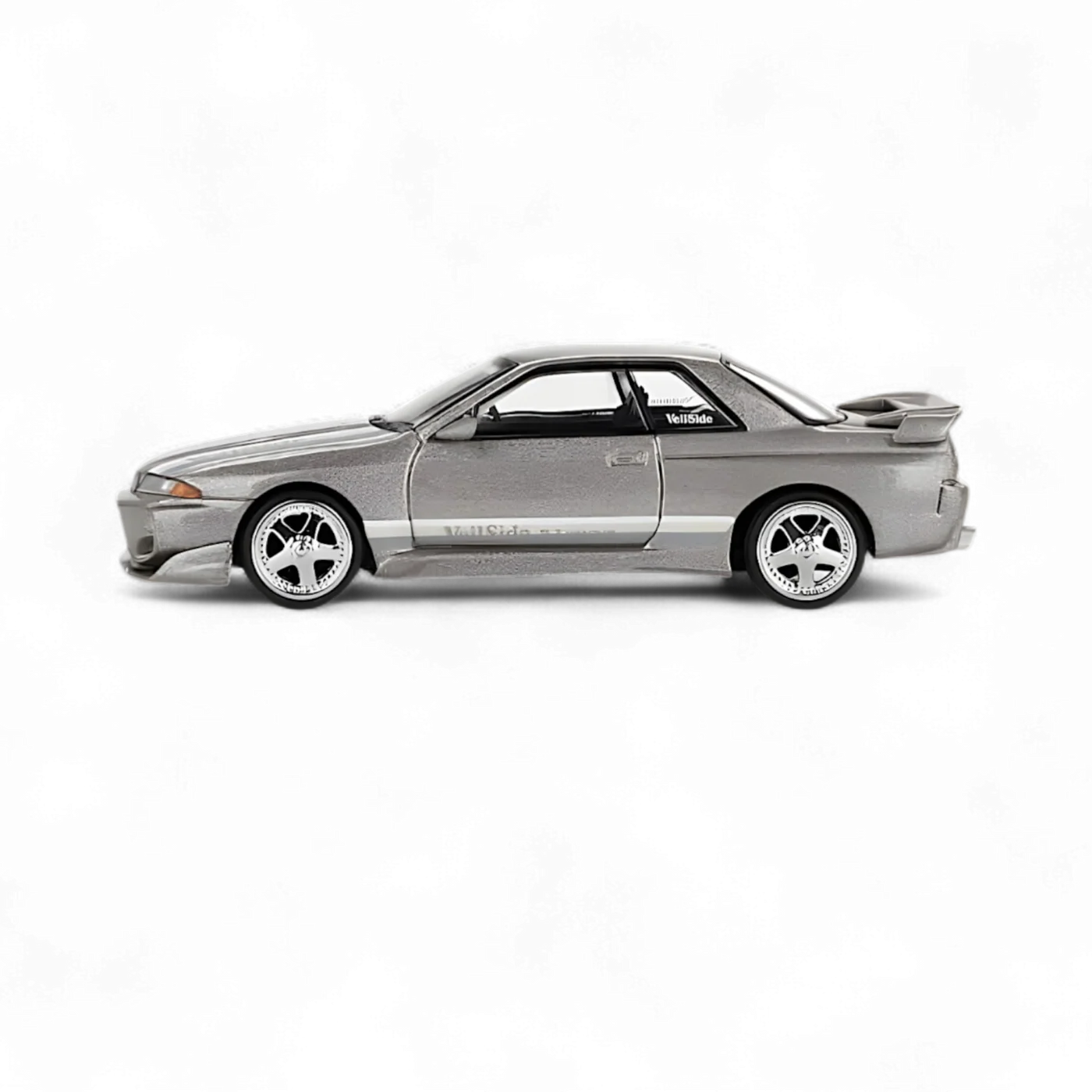 Nissan Skyline GT-R R32 VeilSide Combat gri - 1/64 Mini GT
