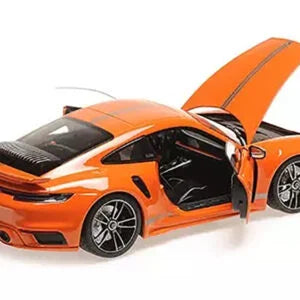 Porsche 911 Turbo S Coupe Sport Design 2021 portocaliu - 1/18 Minichamps