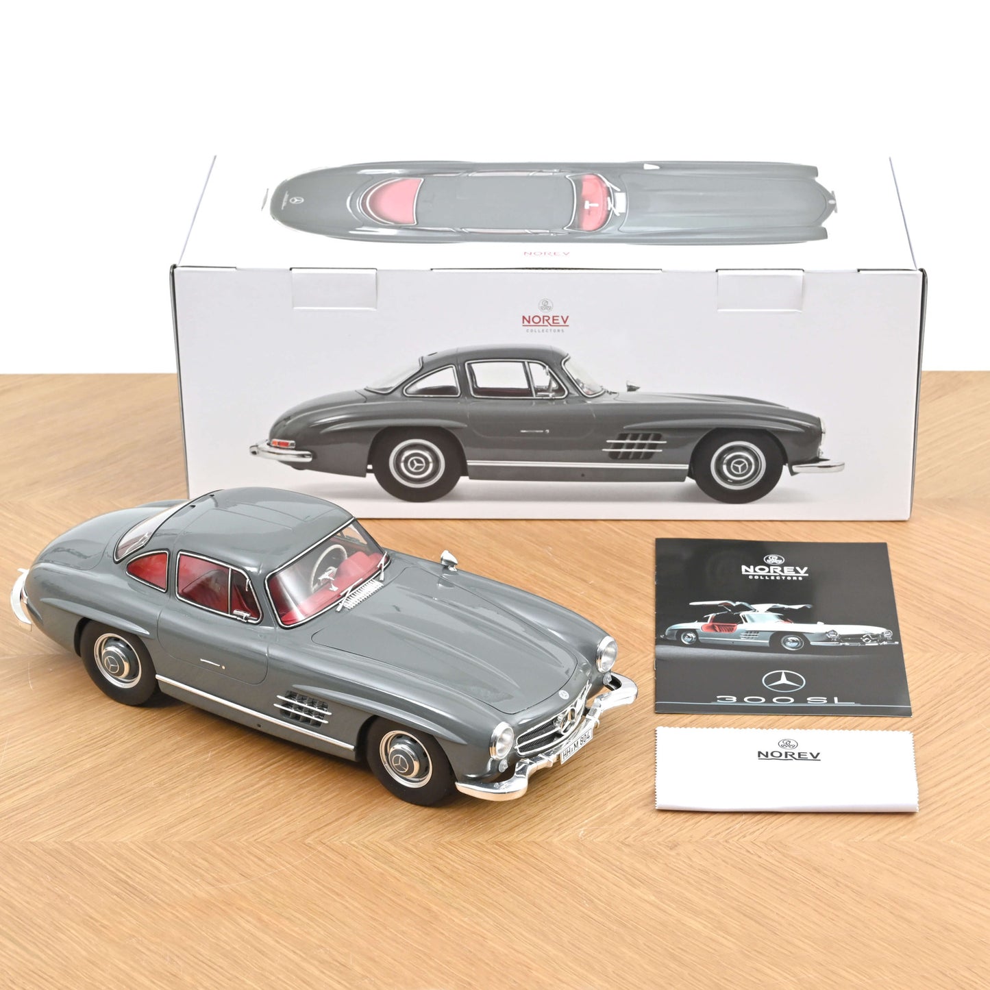 Mercedes-Benz 300 SL 1954 gri Nr. 059/500pcs - 1/12 Norev