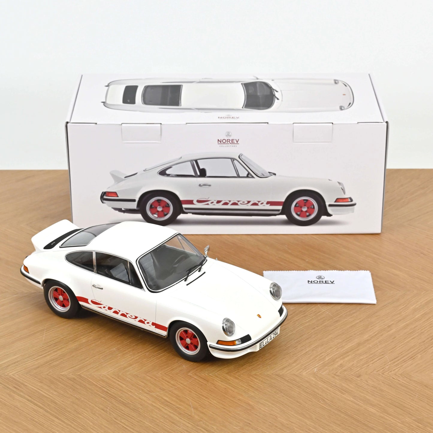 Porsche 911 Carrera RS 2.7 year 1973 Grand Prix alb/rosu -  1/12 Norev