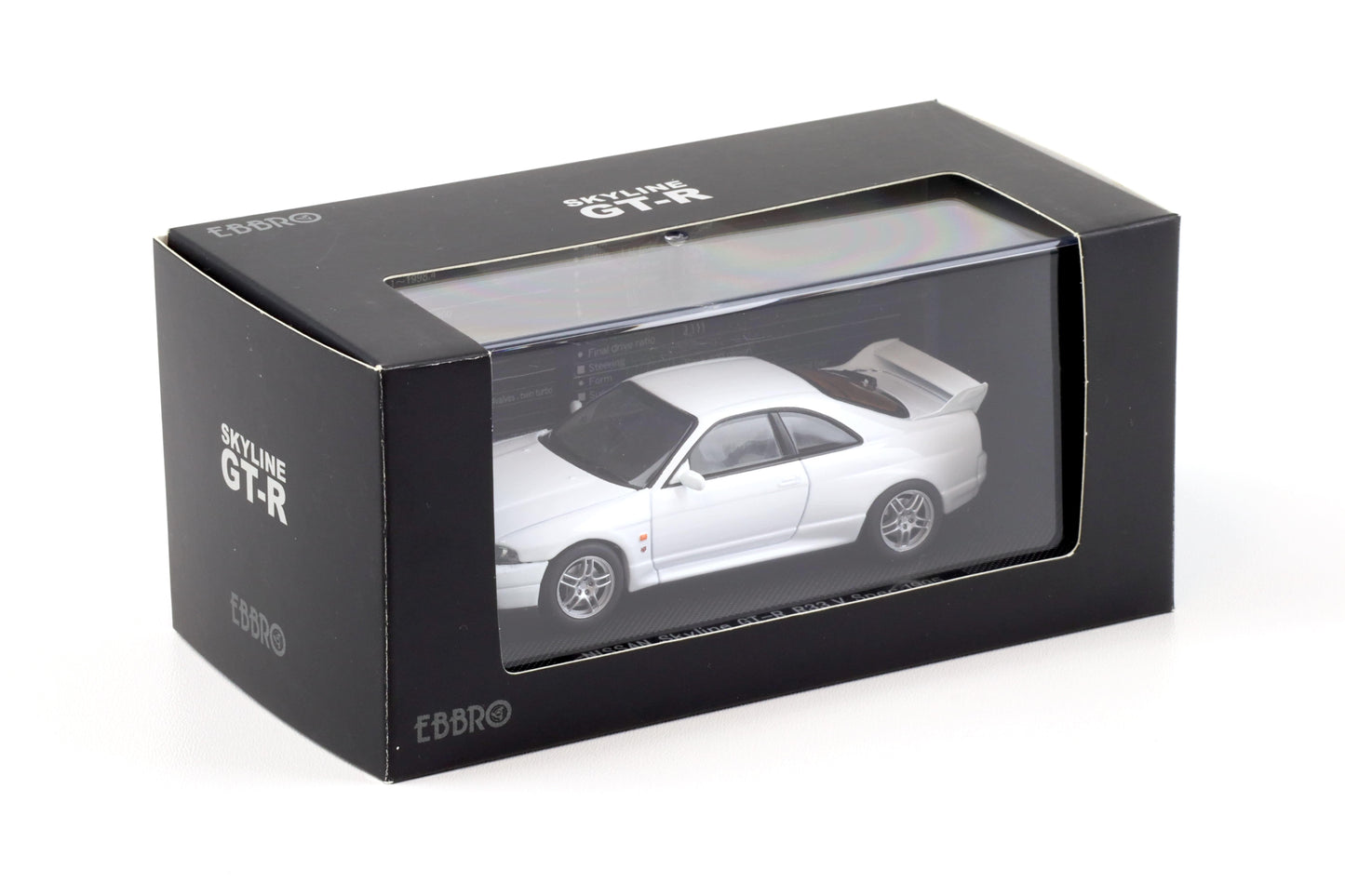 Nissan Skyline GT-R R33 V Spec 1995 alb cu vitrina plexiglass - 1/43 Ebbro