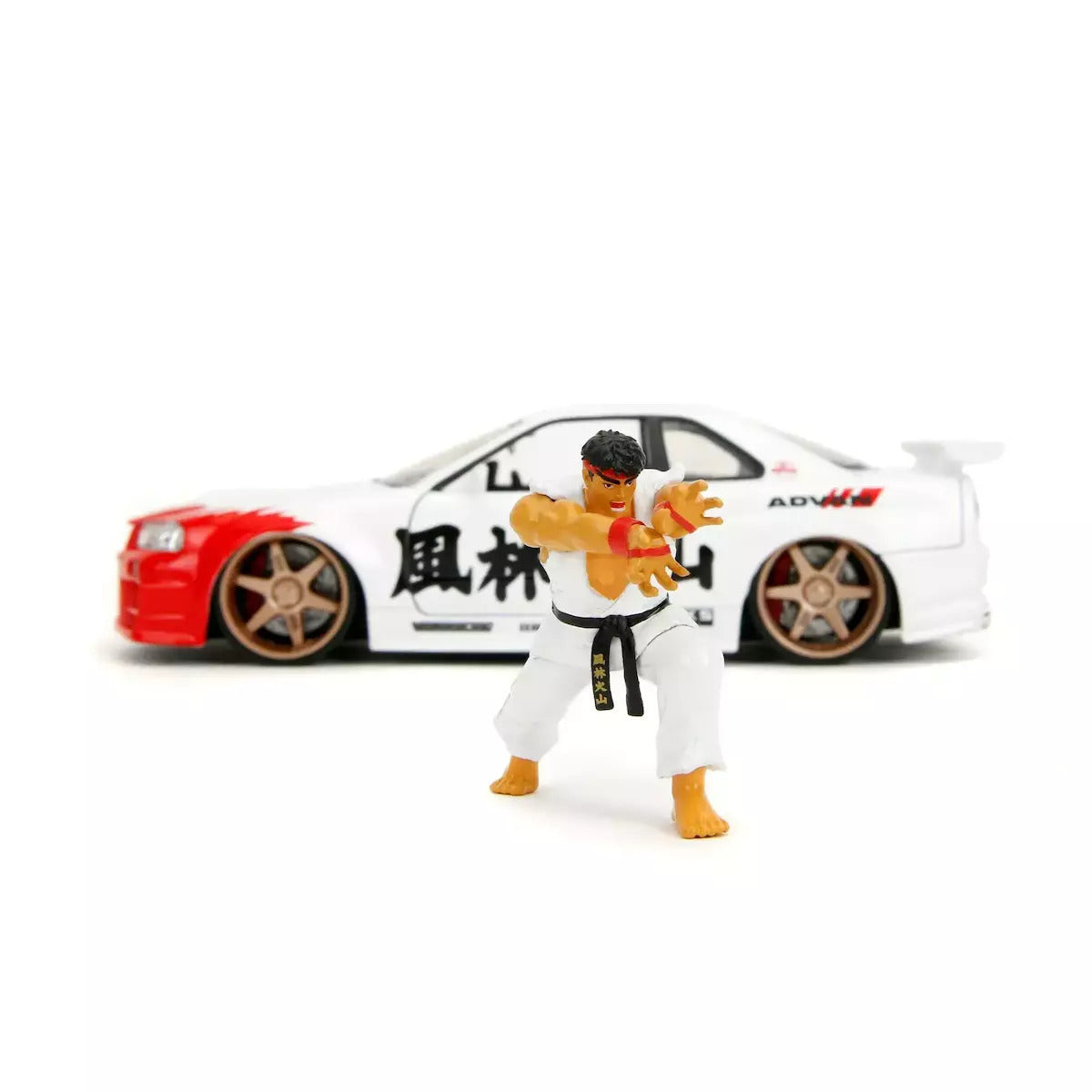 Nissan Skyline GT-R R34 2002 si figurina Ryu - 1/24 Jada