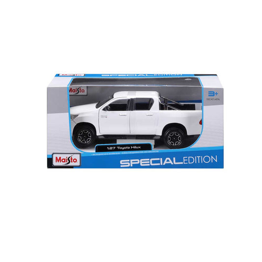 Toyota Hilux alba - 1/27 Maisto
