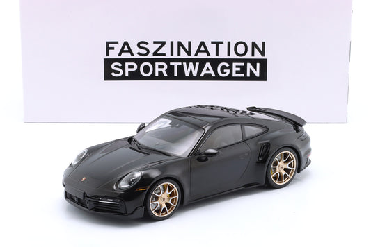 Porsche 911 (992) Turbo S Coupe Sport Design 2024 negru cu jante aurii 1/555pcs - 1/18 Minichamps