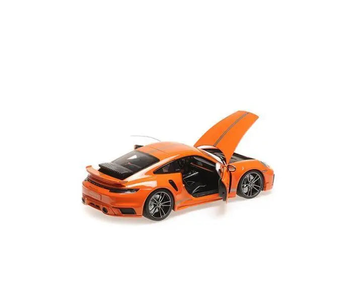 Porsche 911 Turbo S Coupe Sport Design 2021 portocaliu - 1/18 Minichamps