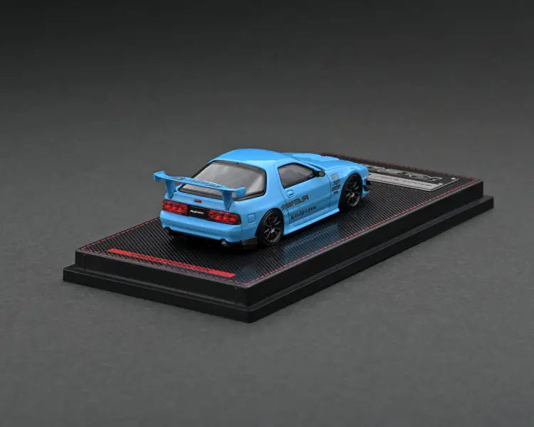 Mazda RX-7 RE Amemiya light blue cu vitrina plexiglass - 1/64 Ignition Model