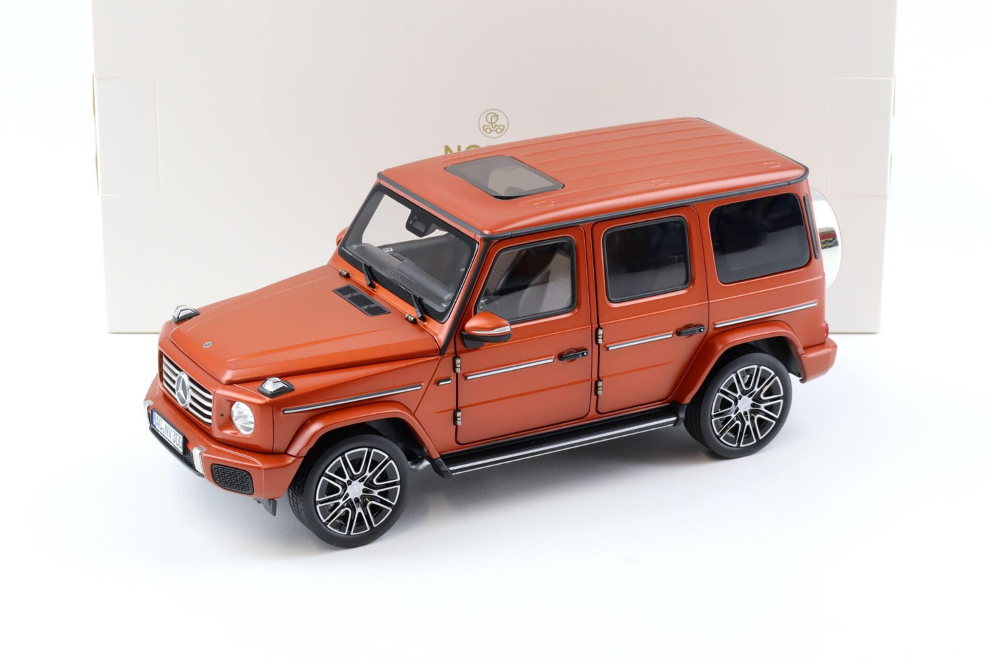 Mercedes-Benz G-Class 2024 copper orange matt - 1/18 Norev
