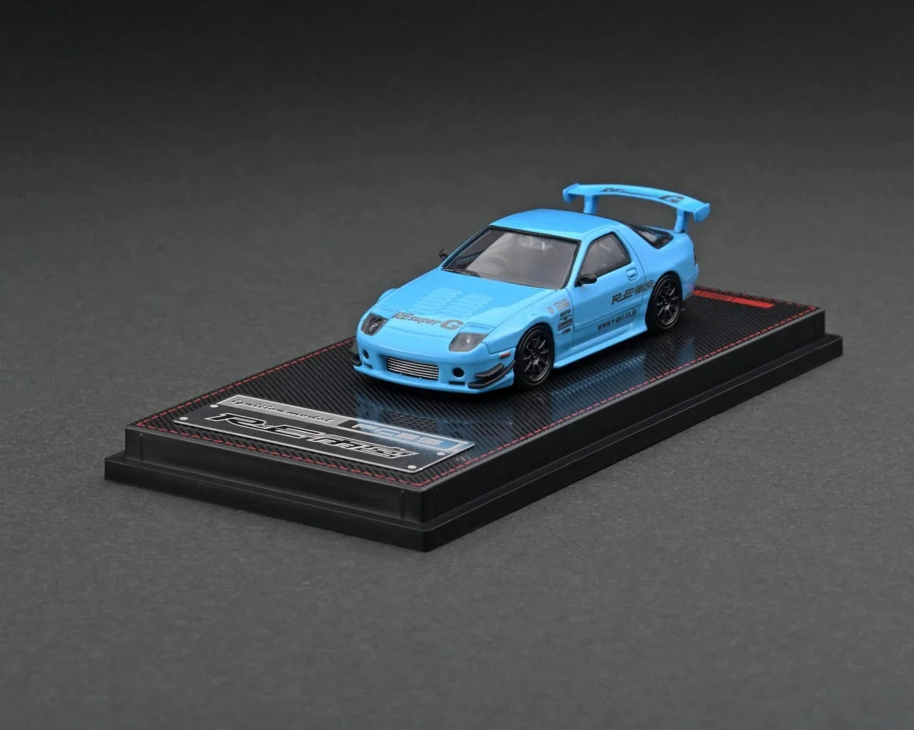 Mazda RX-7 RE Amemiya light blue cu vitrina plexiglass - 1/64 Ignition Model