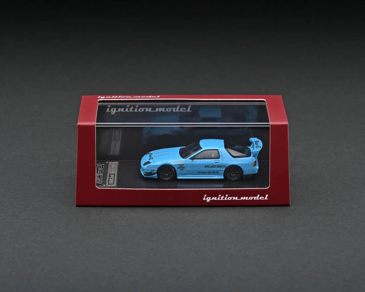 Mazda RX-7 RE Amemiya light blue cu vitrina plexiglass - 1/64 Ignition Model