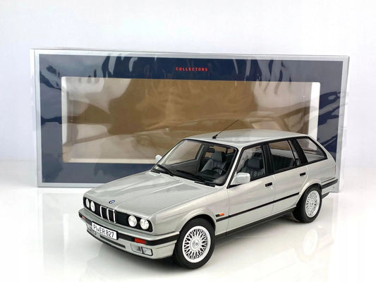 BMW 325i Touring 1991 argintiu - 1/18 Norev