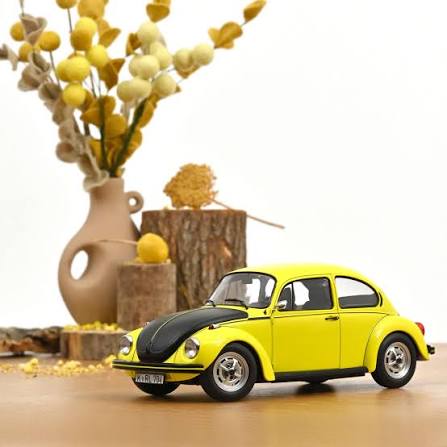 Volkswagen Beetle 1303 1973 yellow-black racer - 1/18 Norev