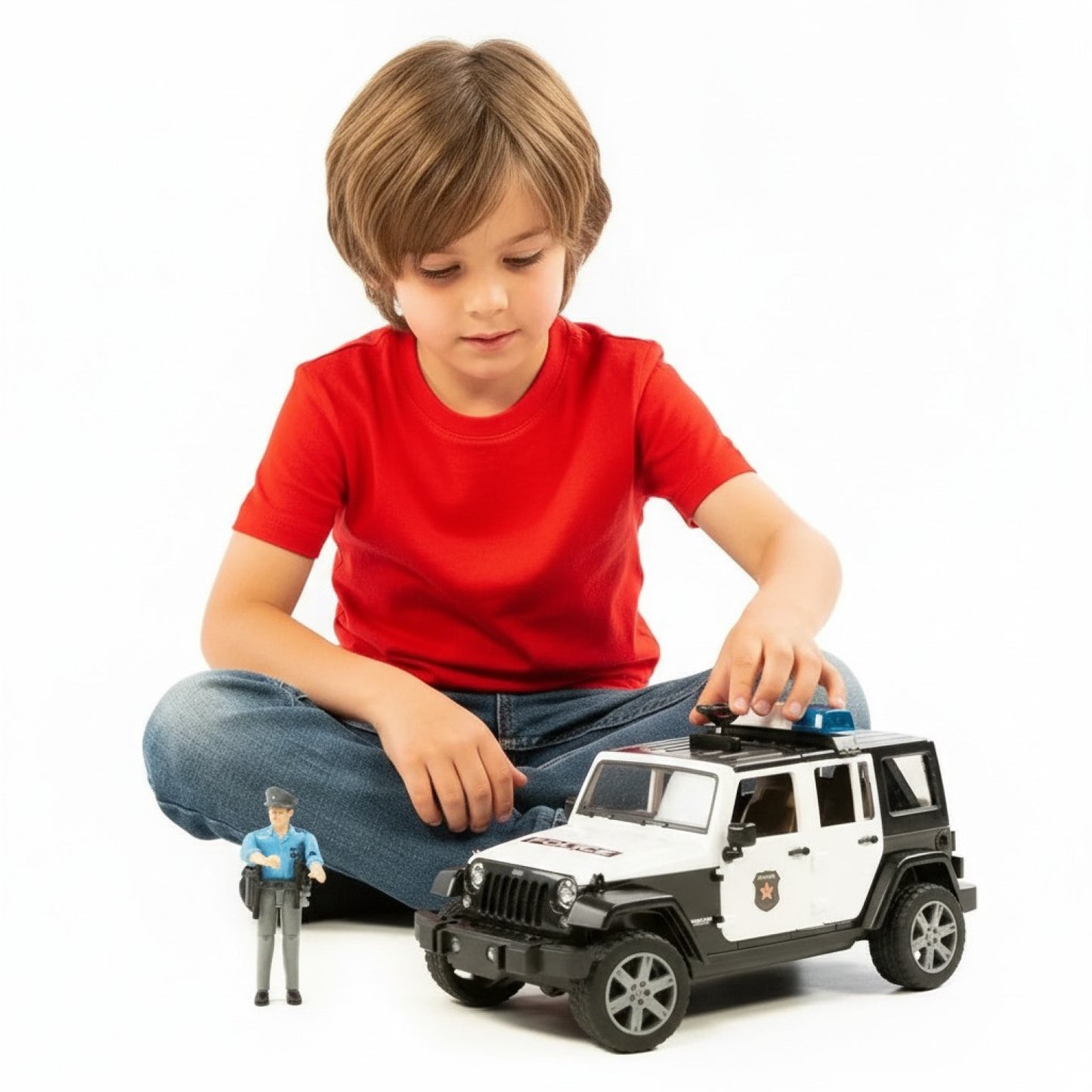 BRUDER 02526 - Masina de politie Jeep Wrangler Rubicon si figurina politist