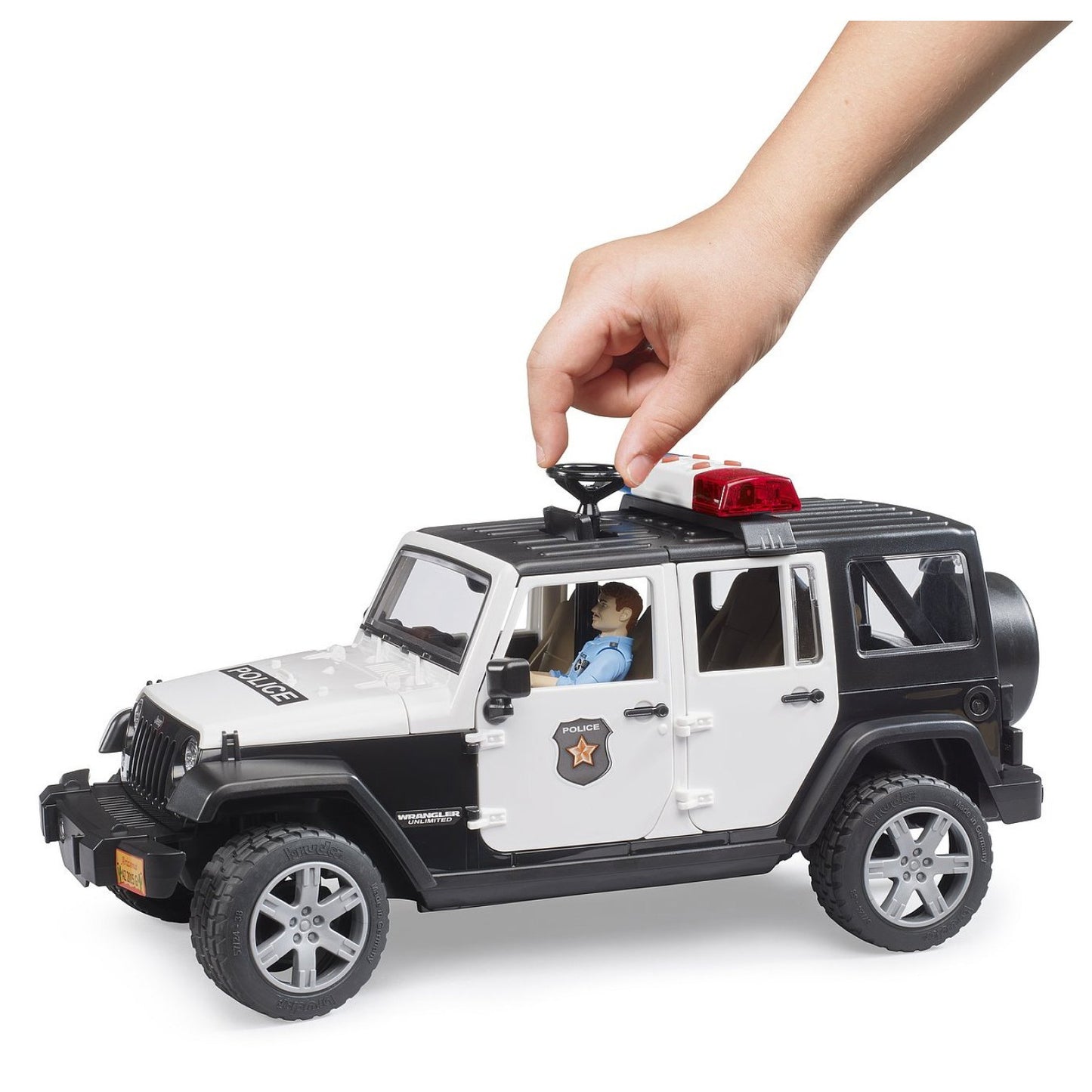 BRUDER 02526 - Masina de politie Jeep Wrangler Rubicon si figurina politist