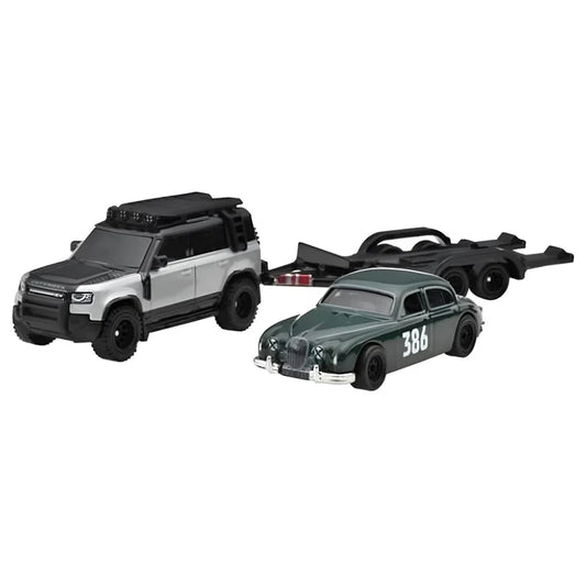 Set 2 masinute Nissan Jaguar MK1 si Land Rover Defender 110 2023 - 1/64 Hot Wheels Premium