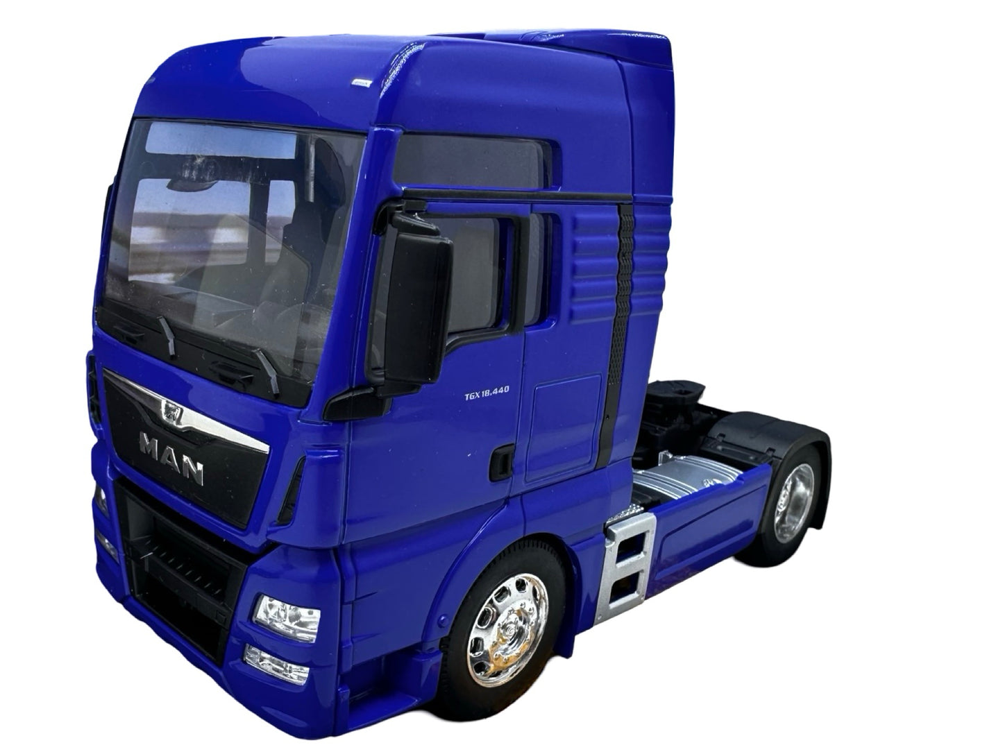 Camion Cap Tractor Man TGX XXL albastru - 1/32 Welly