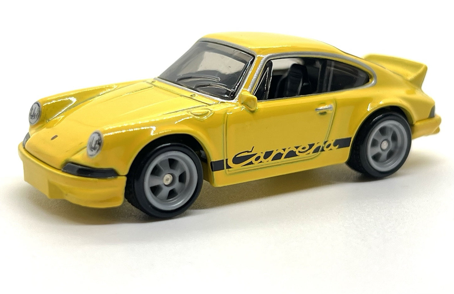 Masinuta metalica Porsche 911 Carrera RS 2.7 galben - 1/64 HW Premium
