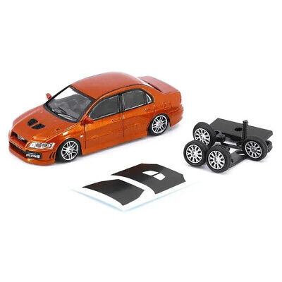 Mitsubishi Lancer Evolution VII custome orange cu roti de schimb si vitrina plexiglass - 1/64 BM Creations Junior